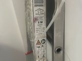 a close up of a door handle with a sticker on it