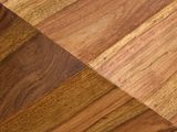 a close up view of a wood floor with different colors of wood