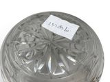 a small glass jar with a label on it