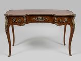 un bureau ancien à deux tiroirs et doté d'un plateau en marbre