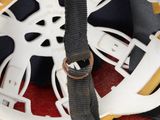 a close up of a helmet with a strap on it