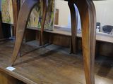 a wooden table that is on top of a wooden shelf