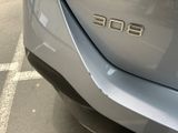 a close up of a car ' s emblem on the side of the car