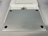 an image of a silver laptop computer sitting on top of a table