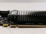 a close up of a video card on a white surface