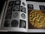 an open book with a picture of a pie on it