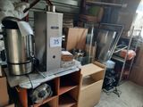 a machine that is sitting on a shelf in a garage