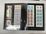 a picture of a collection of stamps on a table