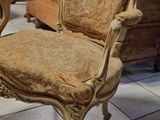 a chair that is sitting on the floor in a room