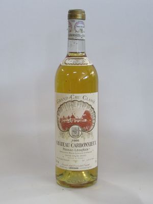 a bottle of wine that is sitting on a table