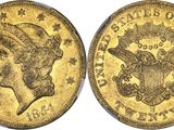 une pièce d'or à l'effigie d'un homme coiffé d'une couronne
