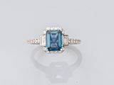 an emerald and diamond ring