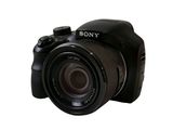 a camera that is sitting on a white surface