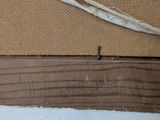a close up of a piece of wood that has been stripped off