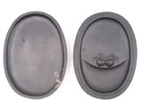 pair of oval cast iron trays with two peas in a pod