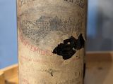 a bottle of wine that is sitting on a table