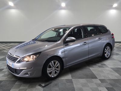 a picture of a silver car on a checkered floor