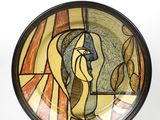 a picture of a plate with a painting on it
