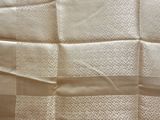 a close up of a piece of paper with a checkered pattern on it