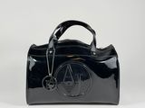 a black handbag with a chain hanging from the handle