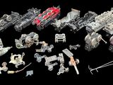 a lot of toy vehicles that are on a black background