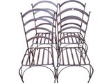 pair of vintage wrought iron patio chairs