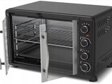 une photo d'un four grille-pain dont la porte est ouverte