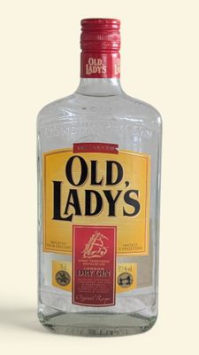 a bottle of old lady ' s dry gin sitting on a table