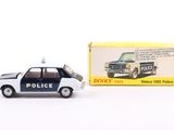 a toy police car next to a boxed box