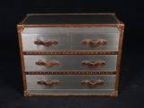 an image of a chest of drawers on a black background