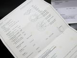 a piece of paper that has some calculations on it