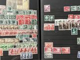 a lot of stamps on the refrigerator door