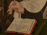 portrait of a man with a book and a pen in his hand