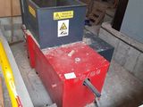 a red box with a yellow sticker on it in the middle of a construction site