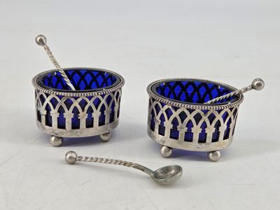pair of silver and blue glass salt and pepper shakers