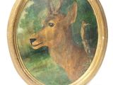tableau représentant un cerf dans un cadre doré sur fond blanc