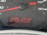 a close up of a speedometer on the dashboard of a car