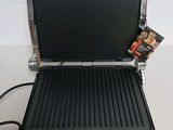 an image of a waffle maker on a table