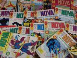 a lot of comic books on the table