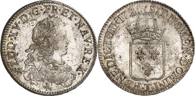 une pièce d'argent avec une couronne au recto et une couronne au verso