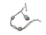 a silver bracelet with blue beads and a silver chain