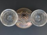 a close up of a light on a wall