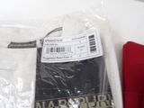 a white t - shirt and a red t - shirt on a table