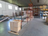 a large warehouse filled with lots of boxes and pallets