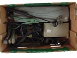 a cardboard box with a bunch of tools inside of it