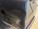a close up of a car ' s rear end with a sticker on it