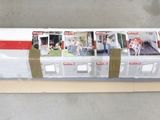 boxes of baseball cards are stacked on top of a carton