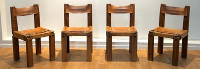 three wooden chairs sitting next to each other on a hard wood floor