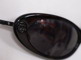 a close up of a pair of sunglasses on a table