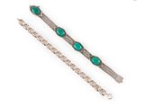a pair of silver and green stone bracelets